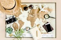 Planning vacation, travel plan, trip vacation using world map along with other travel accessories. Top view, flat lay. Royalty Free Stock Photo
