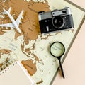 Planning vacation, travel plan, trip vacation using world map along with other travel accessories. Top view, flat lay. Royalty Free Stock Photo