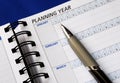 Planning the year on the day planner Royalty Free Stock Photo