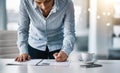 She always plans ahead. a young businesswoman writing notes on a document in an office. Royalty Free Stock Photo