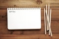 2024 plans on blank notebook paper on white background, 2024 new year mock up, template, flat lay Royalty Free Stock Photo