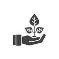 Plant based black glyph icon. Label for cosmetic natural product sign. Hand holding herb. Environment protect. Pictogram for web Royalty Free Stock Photo