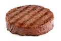 Plant based grilled burger patty with grill marks isolated on white