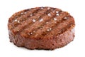 Plant based grilled burger patty with grill marks and rock salt isolated on white Royalty Free Stock Photo