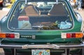 Plant City, FL, February 2023 - Green vintage Volvo 1800 ES with transparent trunk