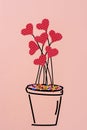 Plant with cutout hearts simulating flowers