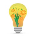 Plant with cog wheels in an electric bulb Royalty Free Stock Photo