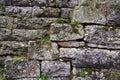 Old wall and stairs made of roughly machined natural stone blocks 2 Royalty Free Stock Photo