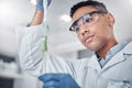 Plant science, pipette and man with test tube for researching plants. Laboratory, sustainability and male botanist with Royalty Free Stock Photo