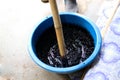 Plant seed stirring in acid for peeling husk shell Royalty Free Stock Photo