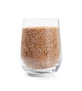 Plantago ovata seeds n glass isolated. Psyllium husk, isabgol dietary fiber, ispaghula, psyllium husk and seeds Royalty Free Stock Photo