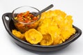 Plantain cup and patacones on white background Royalty Free Stock Photo