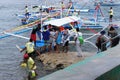 Planting groups of tourists on the boat, going on a tour to the underground river Puerto Princesa Royalty Free Stock Photo