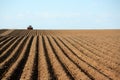 Planting potatoes in an Idaho farm field. Royalty Free Stock Photo