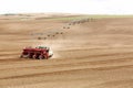 Planting potatoes in the rolling hills in the fertile farm fields of  Idaho Royalty Free Stock Photo