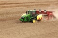 Planting potatoes in the rolling hills in the fertile farm fields of  Idaho Royalty Free Stock Photo