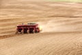 Planting potatoes in the rolling hills in the fertile farm fields of  Idaho Royalty Free Stock Photo