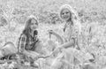 Planting and watering. Planting vegetables. Sisters together helping at farm. Girls planting plants. Garden and beds Royalty Free Stock Photo