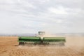 A farmer in a tractor planting wheat. Royalty Free Stock Photo