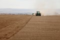 A farmer plants wheat in an Idaho farm field. Royalty Free Stock Photo