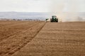 A farmer planting wheat in an Idaho farm field Royalty Free Stock Photo