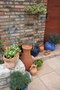 Plants in a clay pot as a decoration of a Mediterranean garden Royalty Free Stock Photo