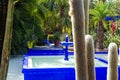 The Majorelle Garden, Jardin Majorelle. Marrakech, Morocco. Plants and furnishing elements, architecture of outdoor spaces