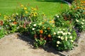 Beds of blooming flowers decorate the Obeliskportal in July. Potsdam, Germany Royalty Free Stock Photo