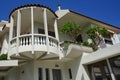 Plumeria blooms with white-yellow flowers on the balcony in August in the village of Lardos, Rhodes Island, Greece Royalty Free Stock Photo