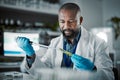 Plants, laboratory and scientist man with natural exam, leaves solution and eco friendly medicine, research or study Royalty Free Stock Photo