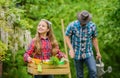 Plants need good care. little girl and happy man dad. earth day. family farm. spring village country. father and Royalty Free Stock Photo