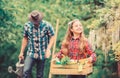 Plants need good care. little girl and happy man dad. earth day. family farm. spring village country. father and Royalty Free Stock Photo