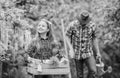 Plants need good care. little girl and happy man dad. earth day. family farm. spring village country. father and Royalty Free Stock Photo