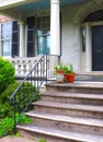 Plants in Pots Adorn Stone Steps at Entrance to a Building Royalty Free Stock Photo