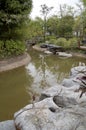 Plants, sink and rocks arranged in the park Royalty Free Stock Photo