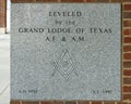 Plaque on City Hall in Grapevine Texas, `Leveled by the Grand Lodge of Texas`.