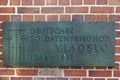 Plaque at the entrance of the cemetery in Vladslo