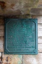 The plaque on the hot walls at Sally Port Old Portsmouth commemorating naval heroes that have embarked from the historic site Royalty Free Stock Photo