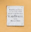 Plaque on the house with the text In this house dwelt between 1432-1435 the ruler Iaru Romanesti Vlad the Dracul son of Mircea the