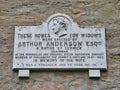 A plaque marking houses built in Twageos Road, Lerwick for the widows of Shetland fishermen and seamen1 by Arthur Anderson