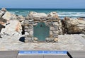 Plaque at southernmost point of Africa against Atlantic Ocean and Indian Ocean at Cape Agulhas