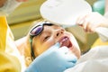 Plaque on teeth colored pink and purple.Baby mouthwash. Dental visit. Teeth before and after brushing and whitening in