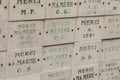 Plaques of thanksgiving to the Virgin Mary on a wall around the Church of the Miraculous Medal in Paris