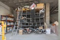 A shelf of a building products company full of pvc pipes Royalty Free Stock Photo