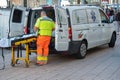 Paramedics moving out ambulance stretcher from car Royalty Free Stock Photo