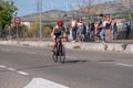 Fitness athletes pedaling their bikes during a national Triathlon, swimming, cycling and running events.