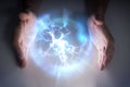 Plasma ball with lightning in hands of magician or illusionist. Royalty Free Stock Photo