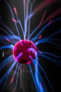 Plasma ball with magenta-blue flames Royalty Free Stock Photo