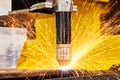 Plasma or laser cutting metalworking with sparks Royalty Free Stock Photo