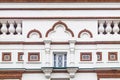 Plaster and decor in classic architecture. Fragment of the facade of the historically traditional architecture of the building. Royalty Free Stock Photo